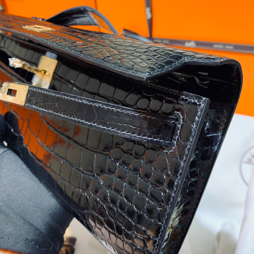 Hermes Kelly Cut 31 in Black Shiny Alligator Leather with Gold Hardware Bag