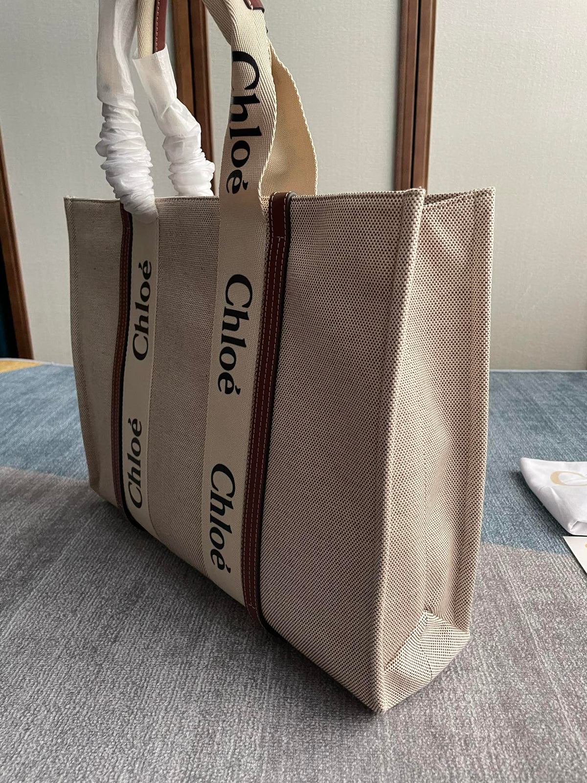 Lagre Strap Woody Tote Bag 45 in Beige Linen Canvas Black Webbing Logo Embroider Brown Calfskin