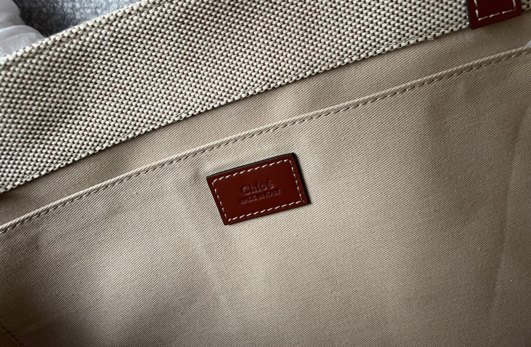 Lagre Strap Woody Tote Bag 45 in Beige Linen Canvas Black Webbing Logo Embroider Brown Calfskin
