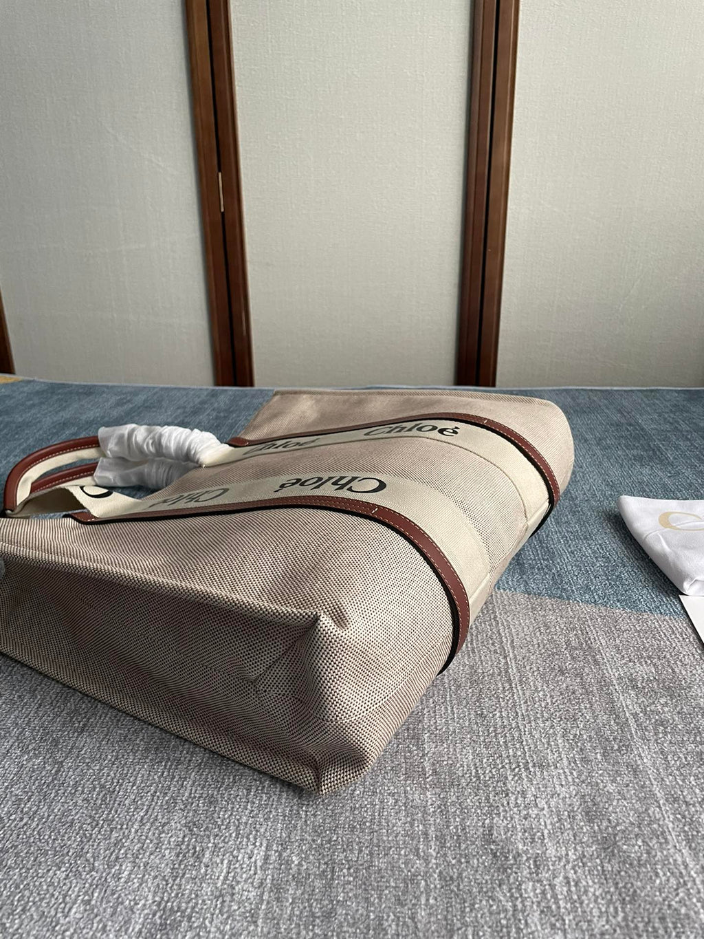 Lagre Strap Woody Tote Bag 45 in Beige Linen Canvas Black Webbing Logo Embroider Brown Calfskin