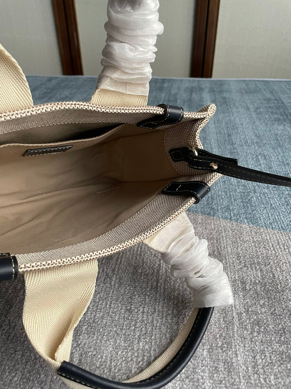 Small Strap Woody Tote Bag 26.5 in Beige Linen Canvas Black Webbing Logo Embroider Black Calfskin