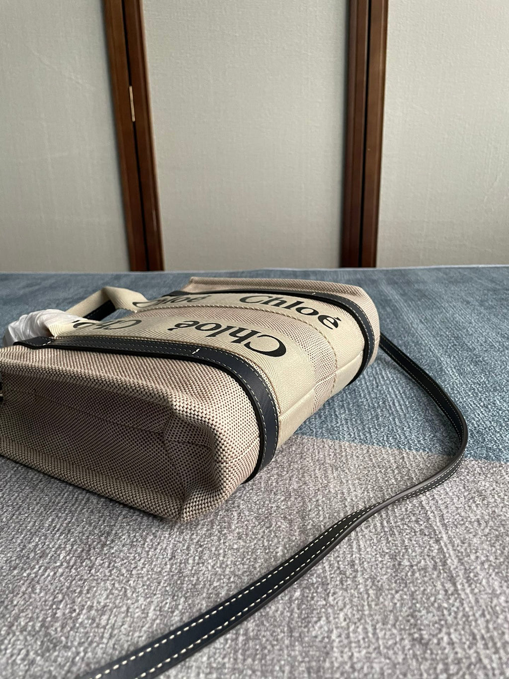 Small Strap Woody Tote Bag 26.5 in Beige Linen Canvas Black Webbing Logo Embroider Black Calfskin