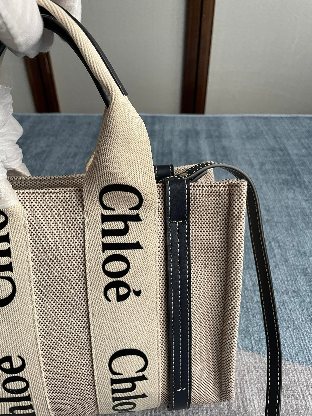 Small Strap Woody Tote Bag 26.5 in Beige Linen Canvas Black Webbing Logo Embroider Black Calfskin