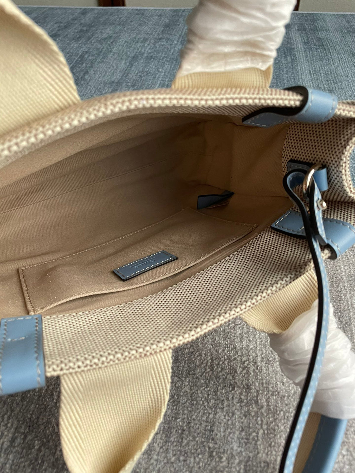 Small Strap Woody Tote Bag 26.5 in Beige Linen Canvas Black Webbing Logo Embroider Blue Calfskin