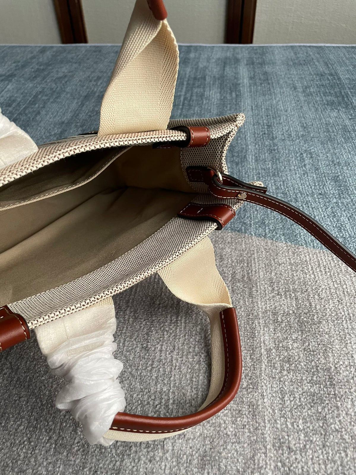 Small Strap Woody Tote Bag 26.5 in Beige Linen Canvas Black Webbing Logo Embroider Brown Calfskin