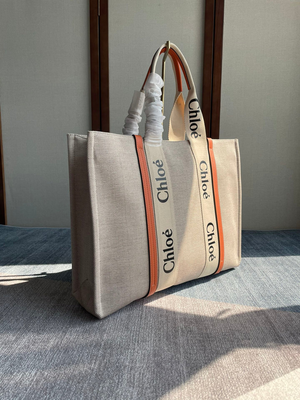 Lagre Woody Tote Bag 45 in Beige Linen Canvas Black Webbing Logo Embroider Orange Calfskin