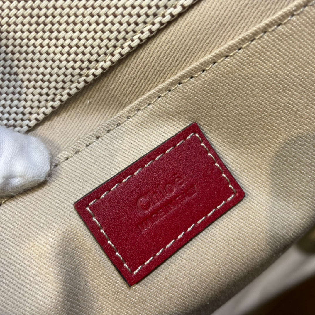 Medium Strap Woody Tote Bag 37 in Beige Linen Canvas Black Webbing Logo Embroider Red Calfskin