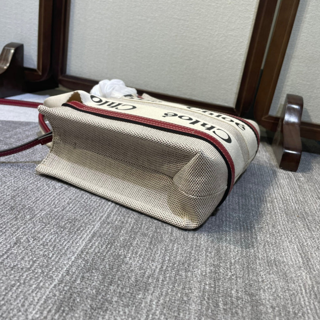 Small Strap Woody Tote Bag 26.5 in Beige Linen Canvas Black Webbing Logo Embroider Red Calfskin