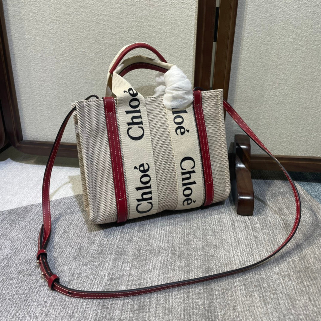 Small Strap Woody Tote Bag 26.5 in Beige Linen Canvas Black Webbing Logo Embroider Red Calfskin