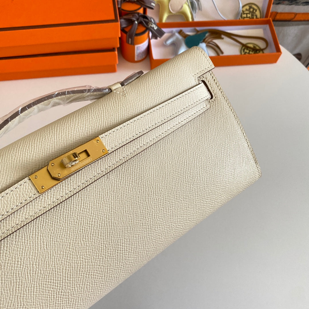 Hermes Kelly Cut 31 in Beige Cream Calfskin with Gold Hardware Bag