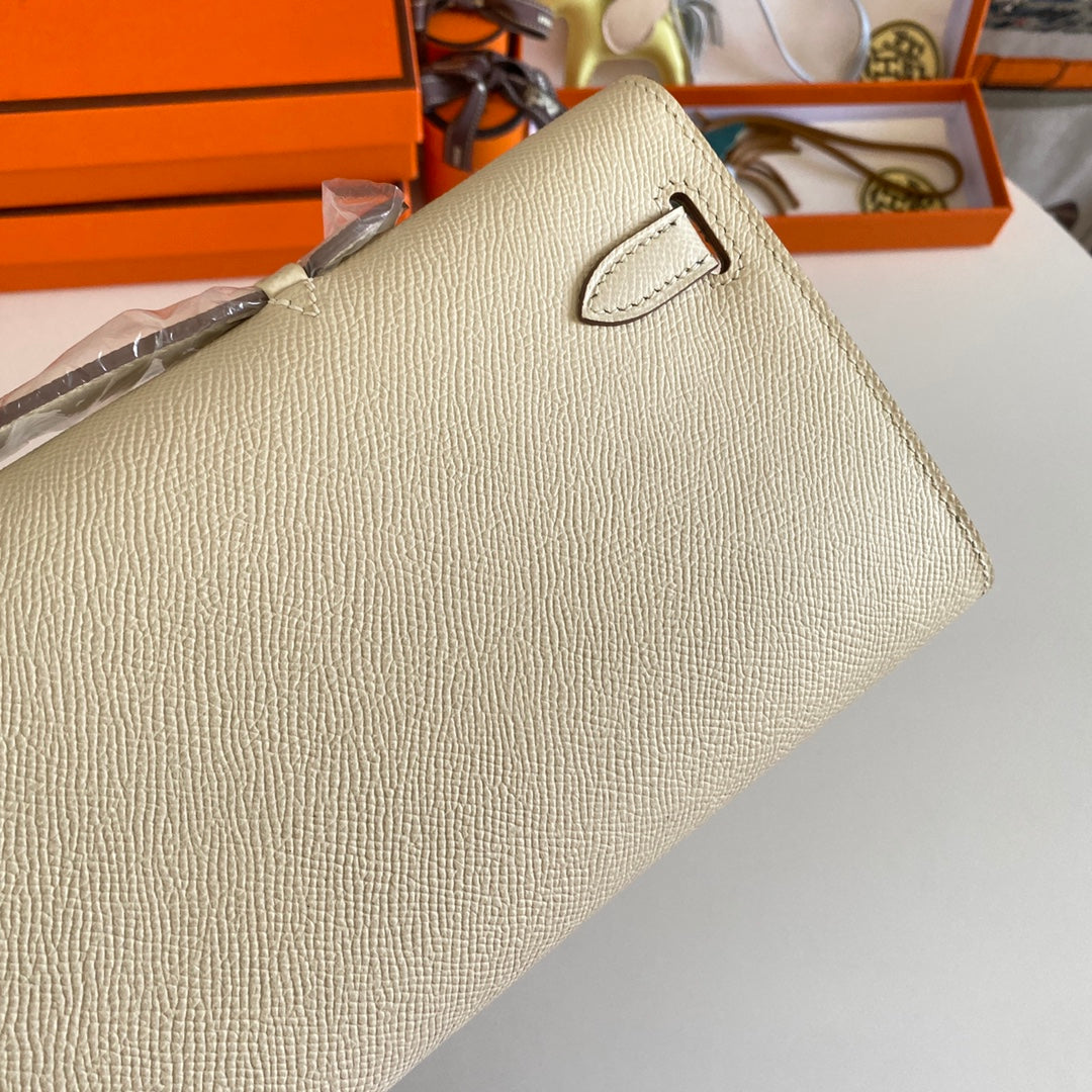 Hermes Kelly Cut 31 in Beige Cream Calfskin with Gold Hardware Bag
