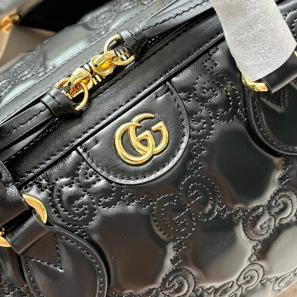 Gucci Matelassé Top Handle Bag 31 in Black Embossed Calfskin Gold Hardware