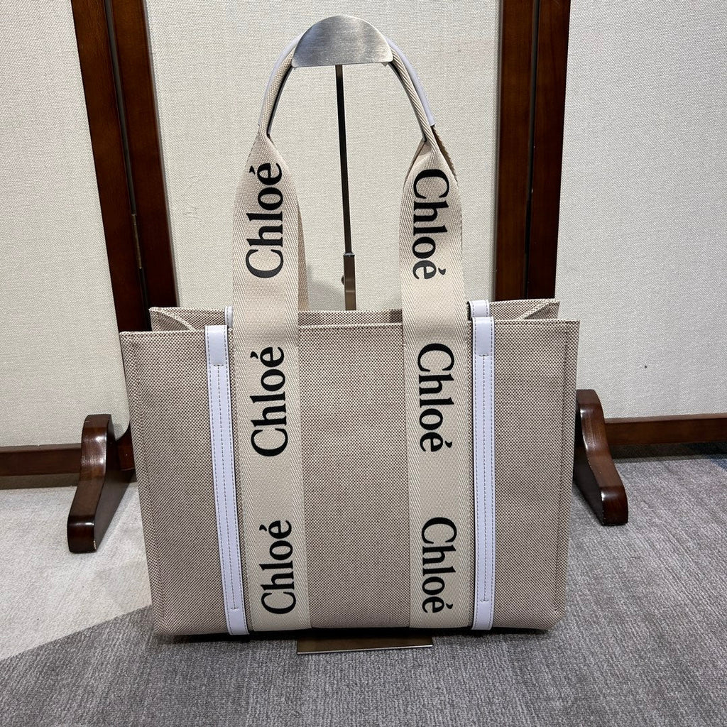 Medium Woody Tote Bag 37 in Beige Linen Canvas Webbing Black Logo Embroider White Calfskin