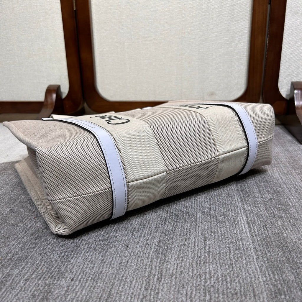 Medium Woody Tote Bag 37 in Beige Linen Canvas Webbing Black Logo Embroider White Calfskin