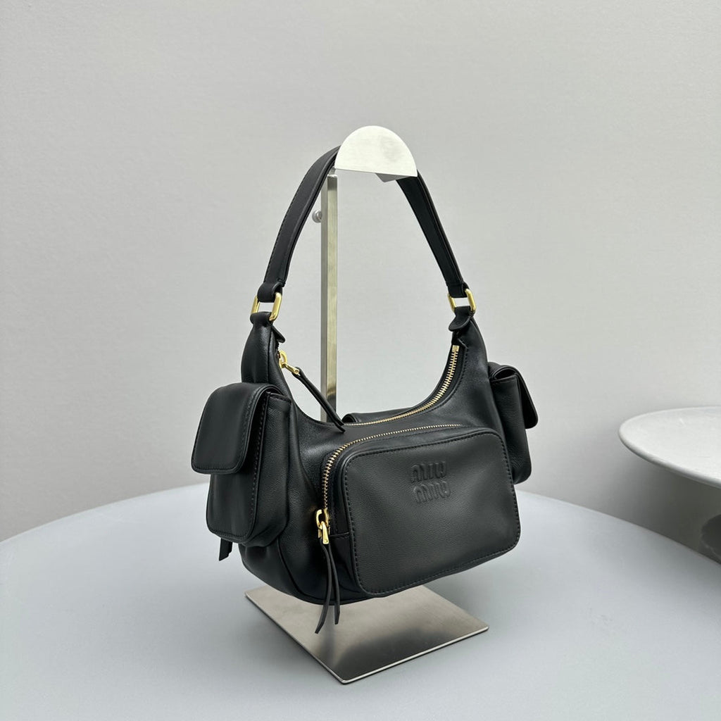 Pucket Bag 21 in Black Calfskin