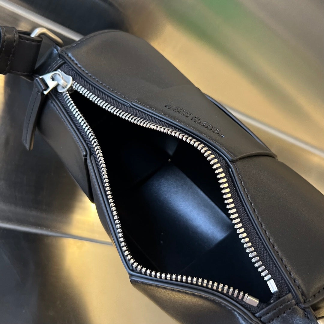 Bottega Veneta Small Cylinder Cassette 21 in Black Calfskin Bag