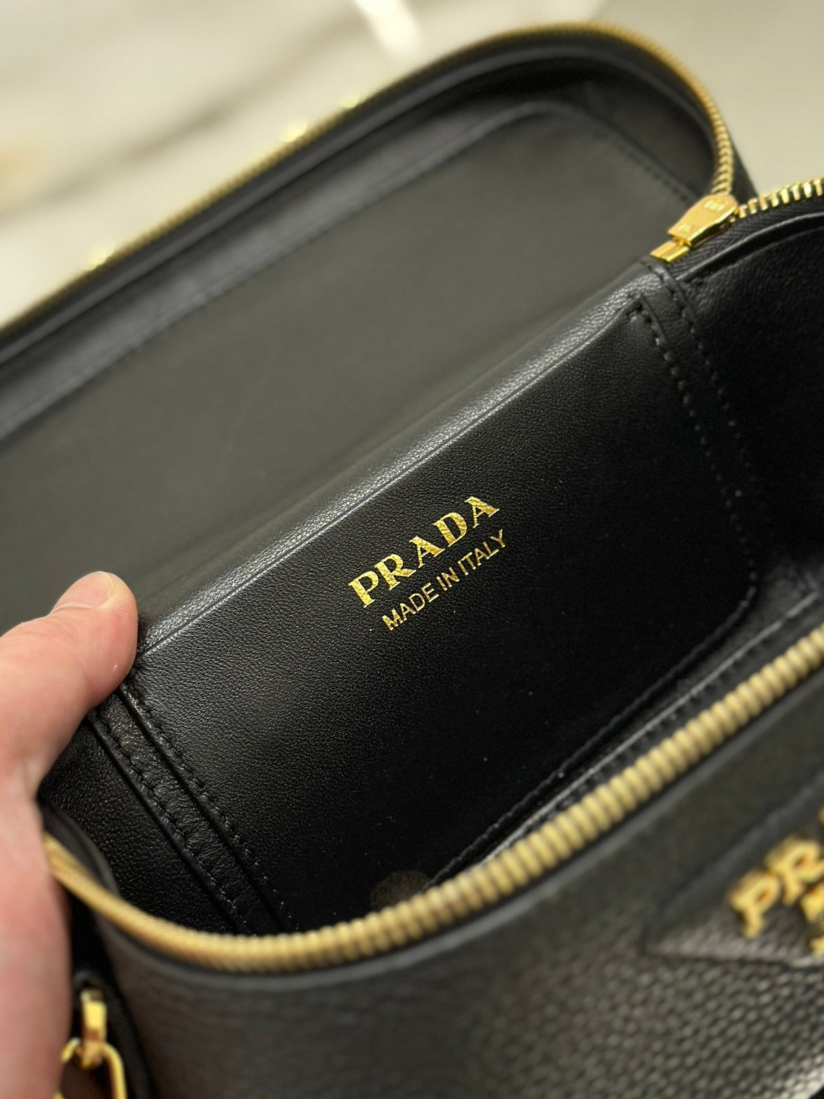 Prada Vanity Case 18 in Black Grained Calfskin Gold Hardware