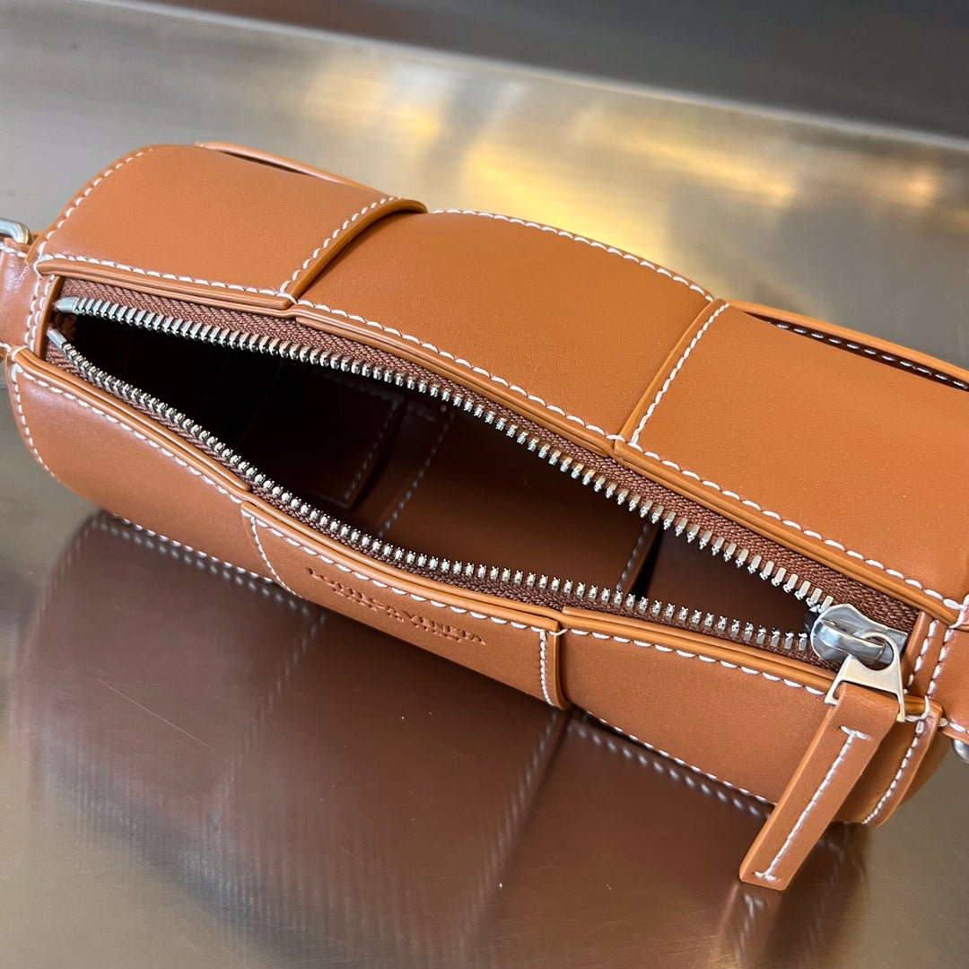 Bottega Veneta Small Cylinder Cassette 21 in Raw Sienna Calfskin Bag