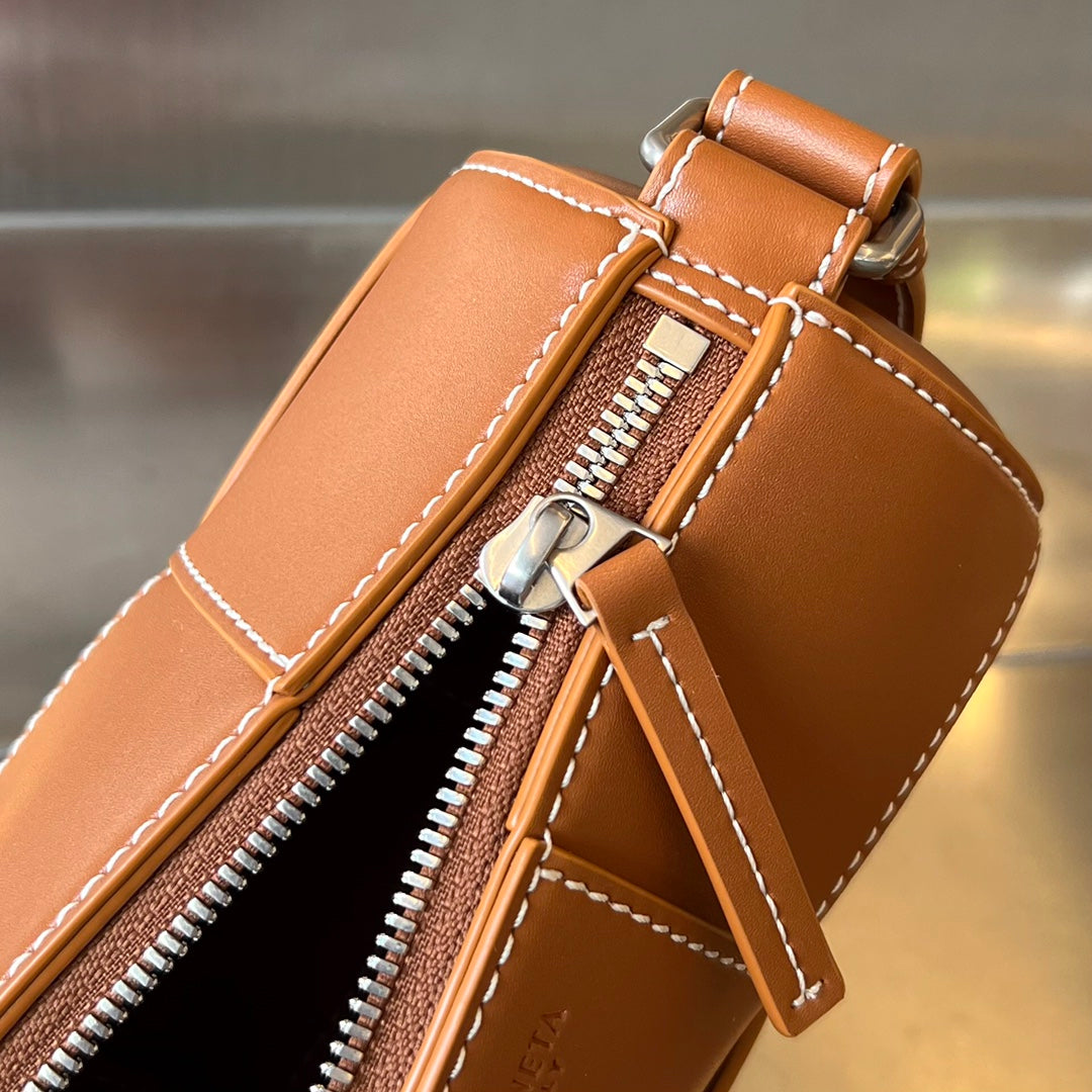 Bottega Veneta Small Cylinder Cassette 21 in Raw Sienna Calfskin Bag