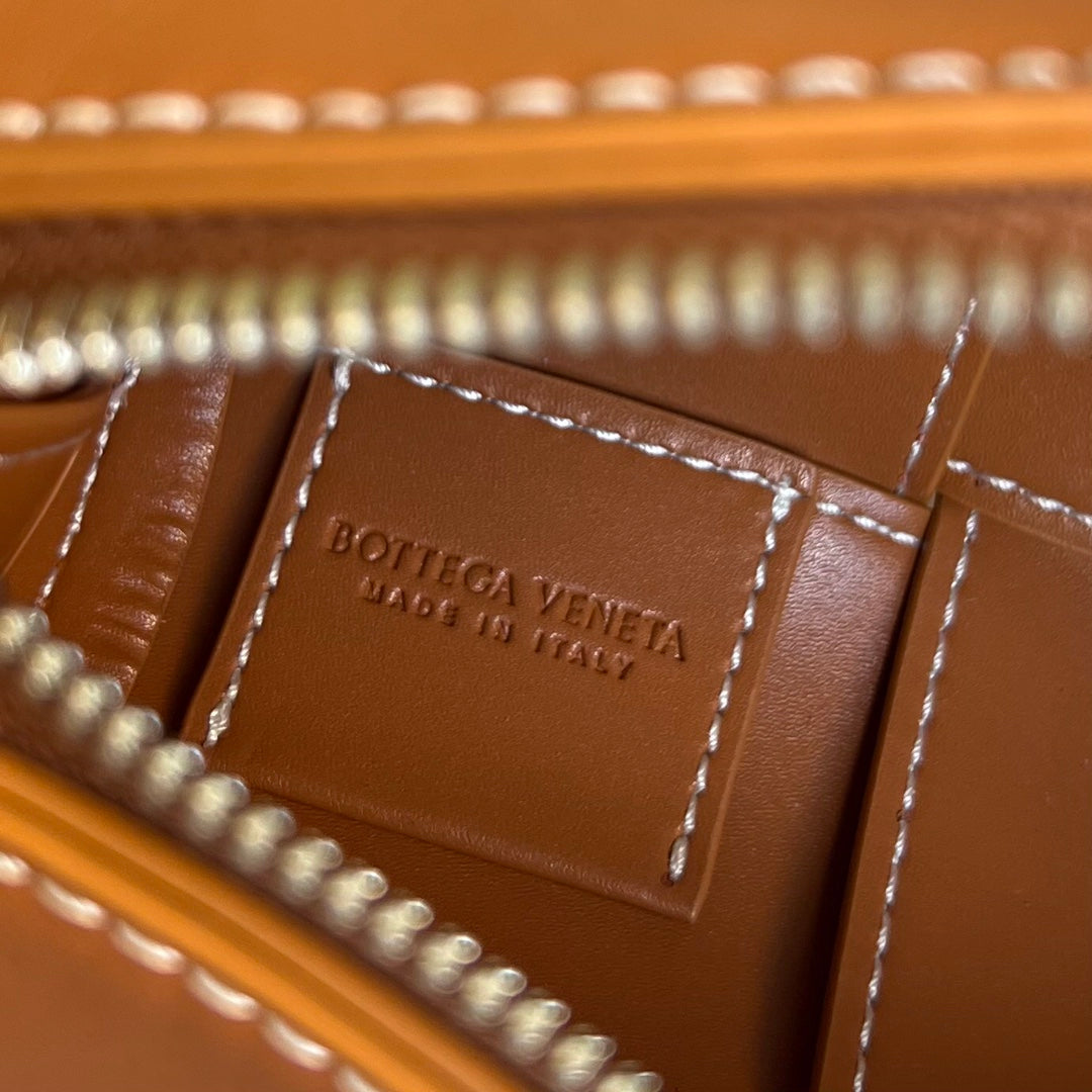 Bottega Veneta Small Cylinder Cassette 21 in Raw Sienna Calfskin Bag