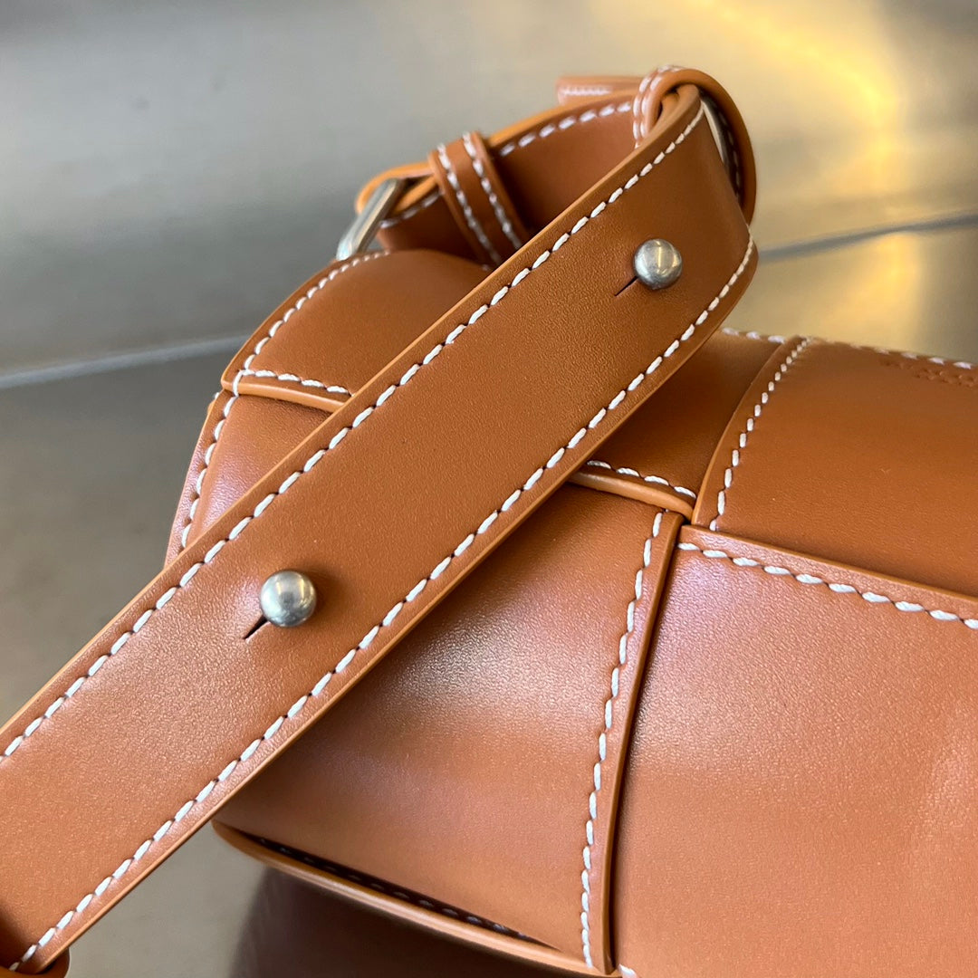 Bottega Veneta Small Cylinder Cassette 21 in Raw Sienna Calfskin Bag