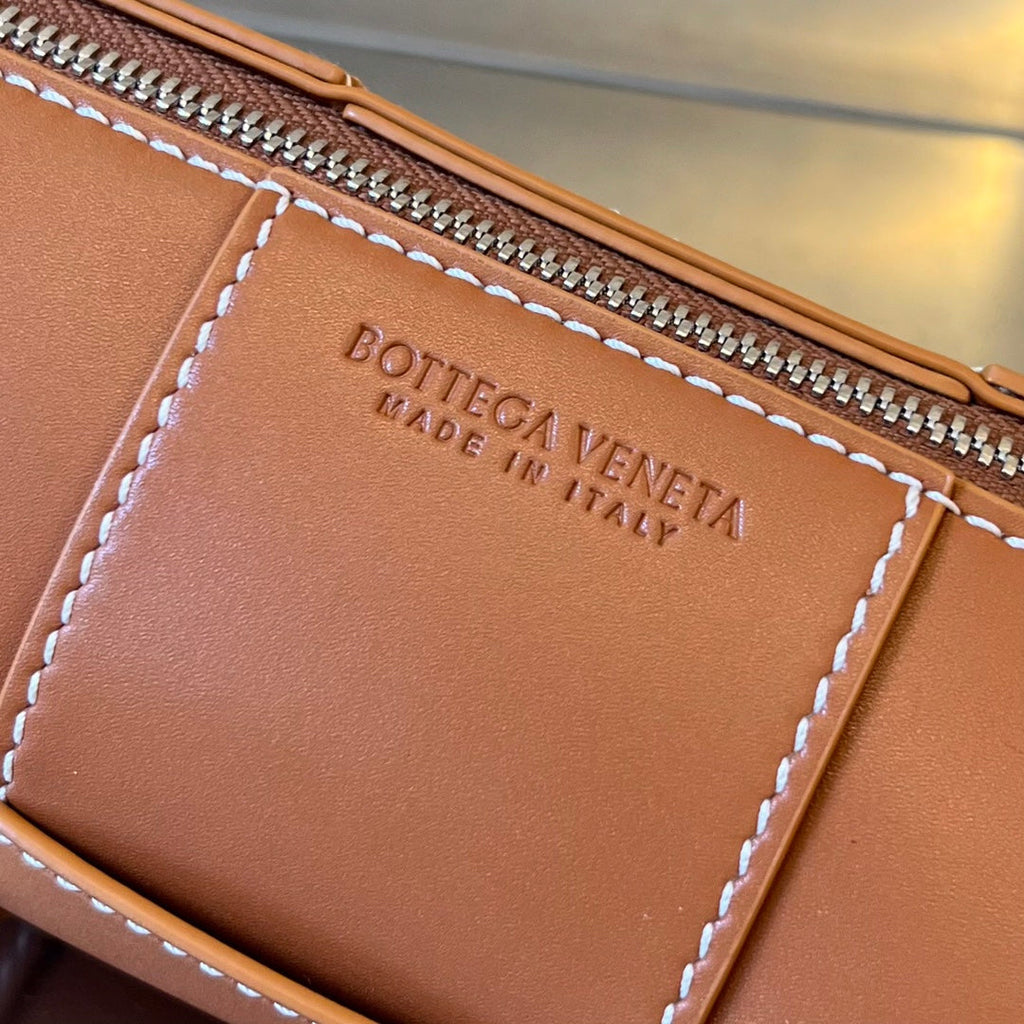 Bottega Veneta Small Cylinder Cassette 21 in Raw Sienna Calfskin Bag