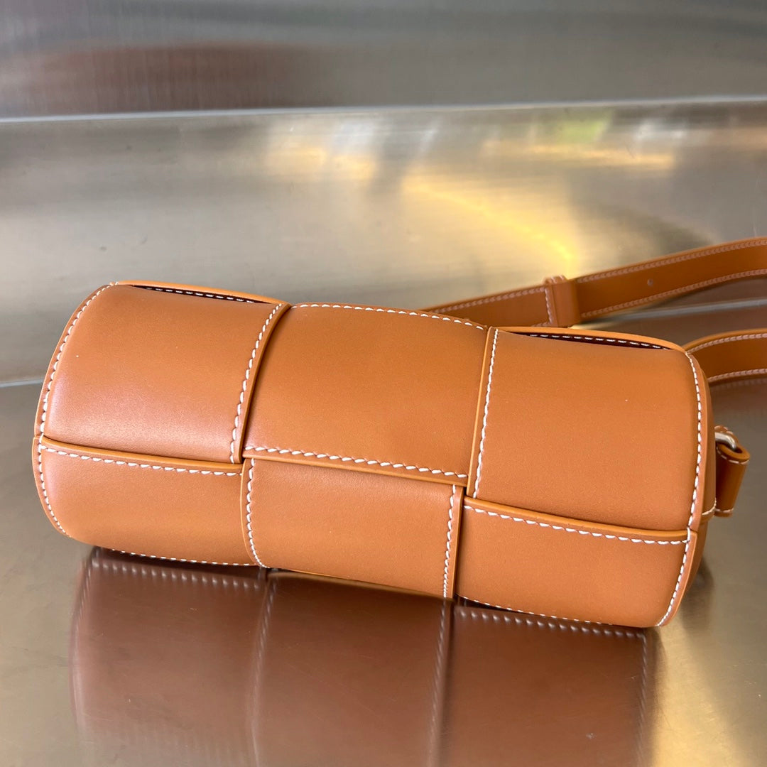 Bottega Veneta Small Cylinder Cassette 21 in Raw Sienna Calfskin Bag