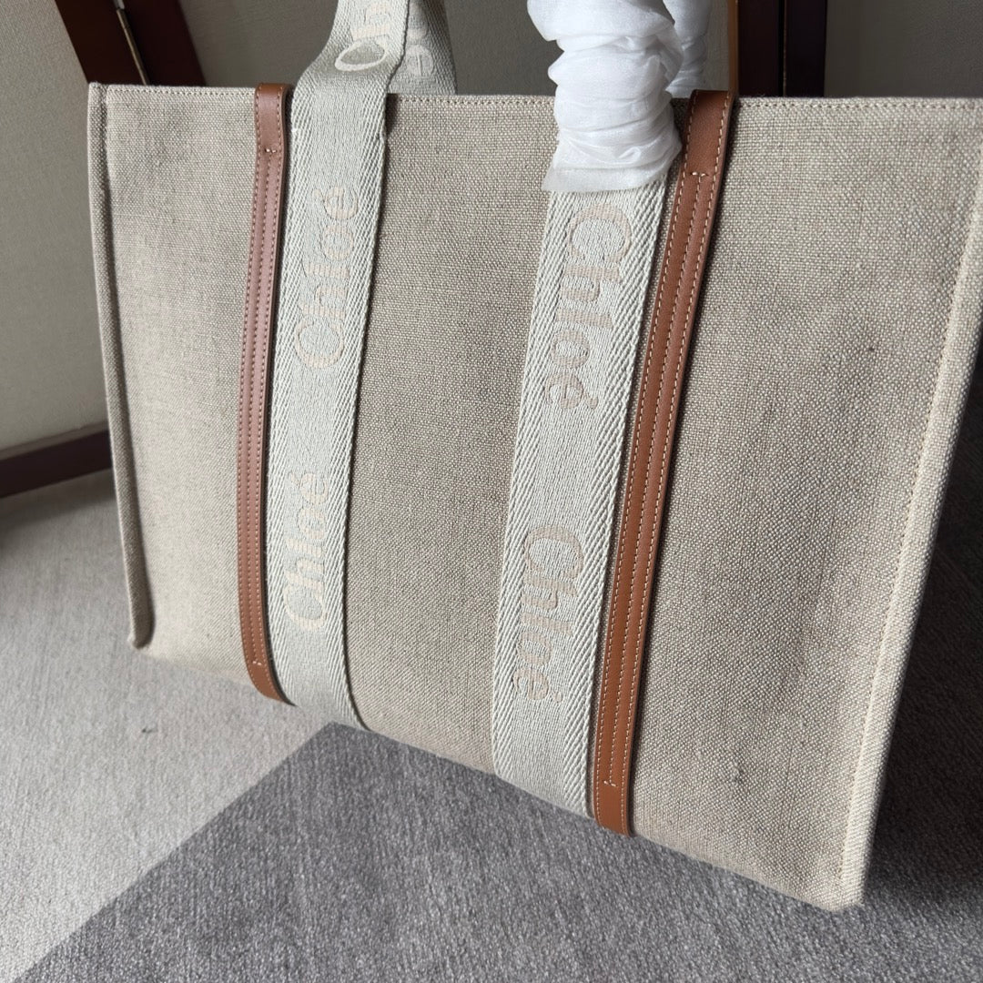 Lagre Woody Tote Bag 45 in Beige Linen Canvas Webbing Logo Embroidery Brown Calfskin