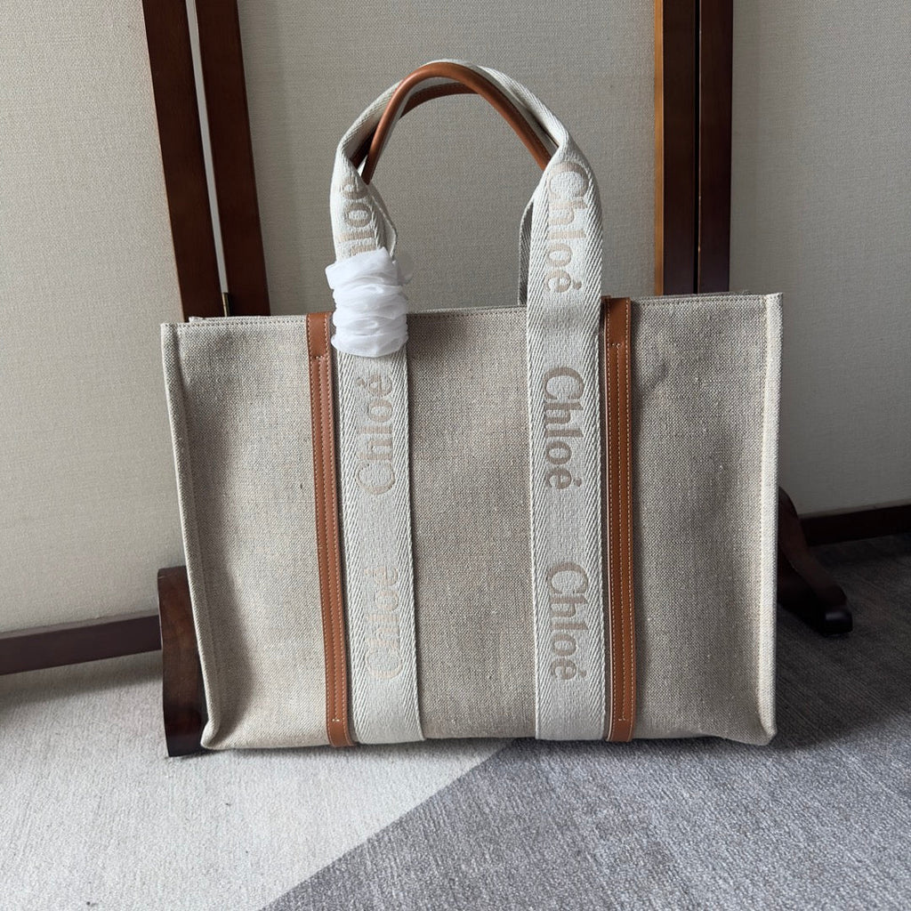 Lagre Woody Tote Bag 45 in Beige Linen Canvas Webbing Logo Embroidery Brown Calfskin