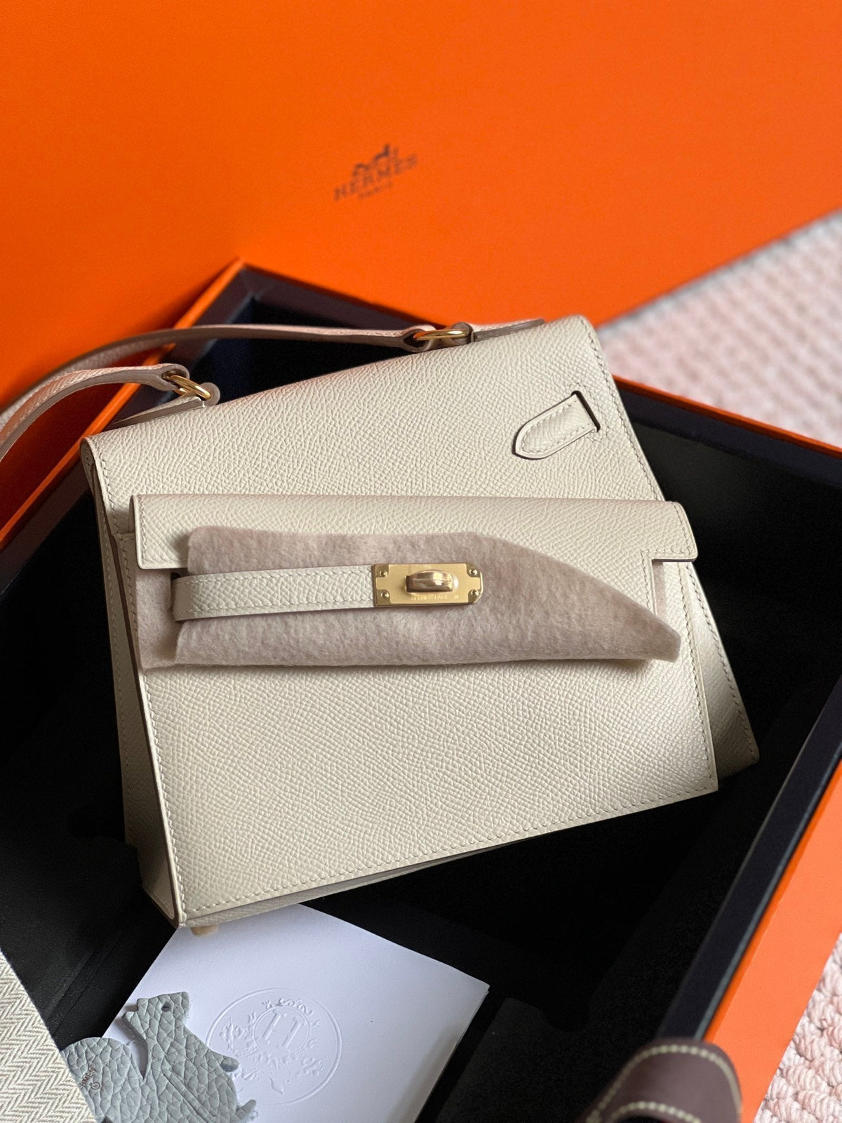 Hermes Kelly Desordre 20 in White Epsom Leather with Gold Hardware Bag