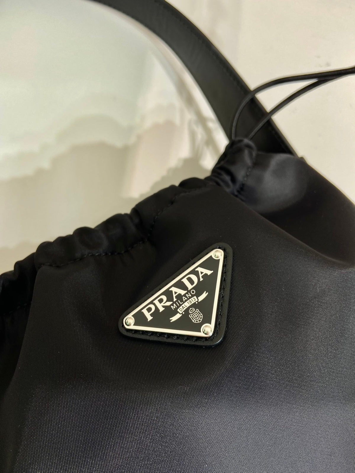 Prada Small Drawstring Bag 23 in Black Re-Nylon