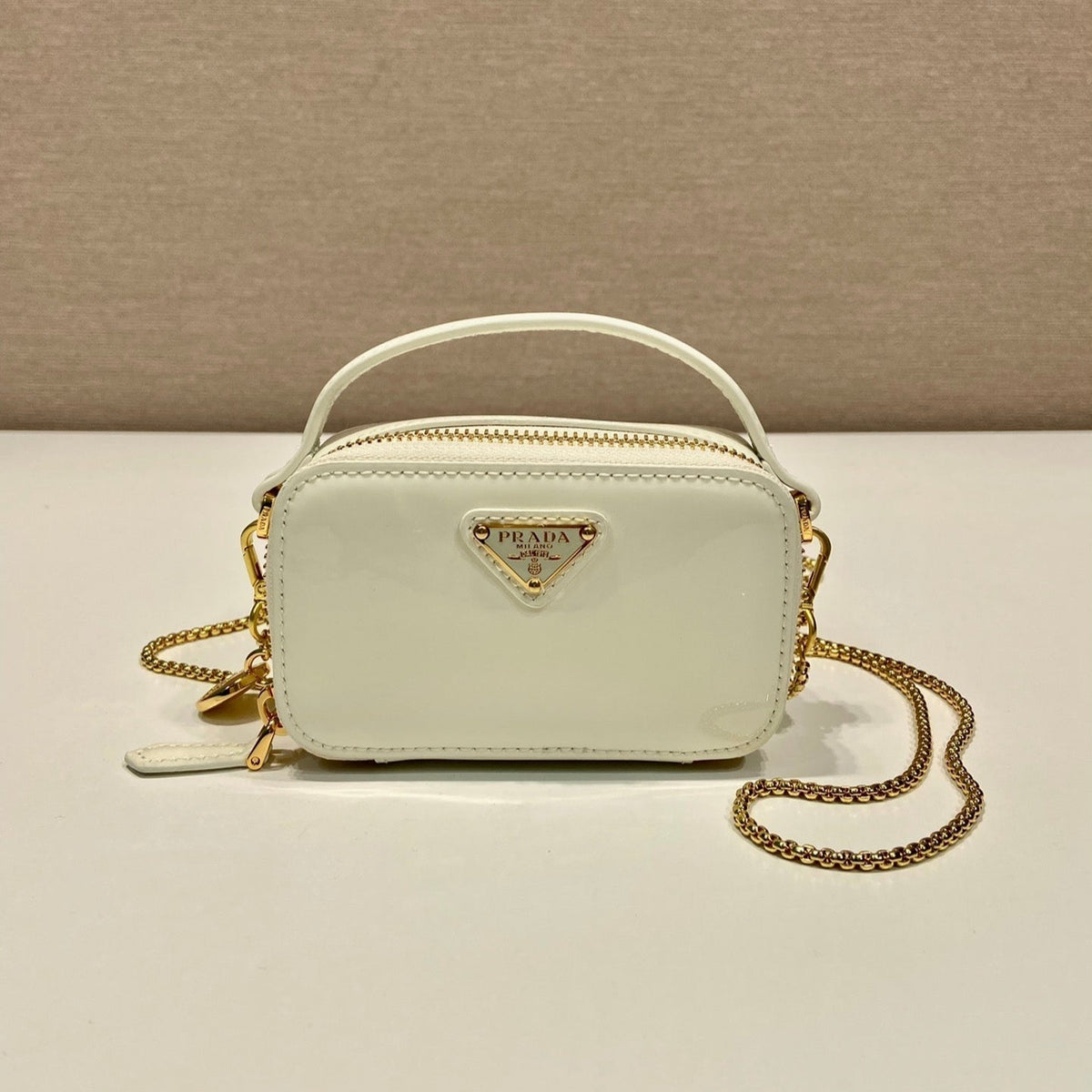 Prada Mini Hand Bag 11 with Gold Strap in White Patent Calfskin