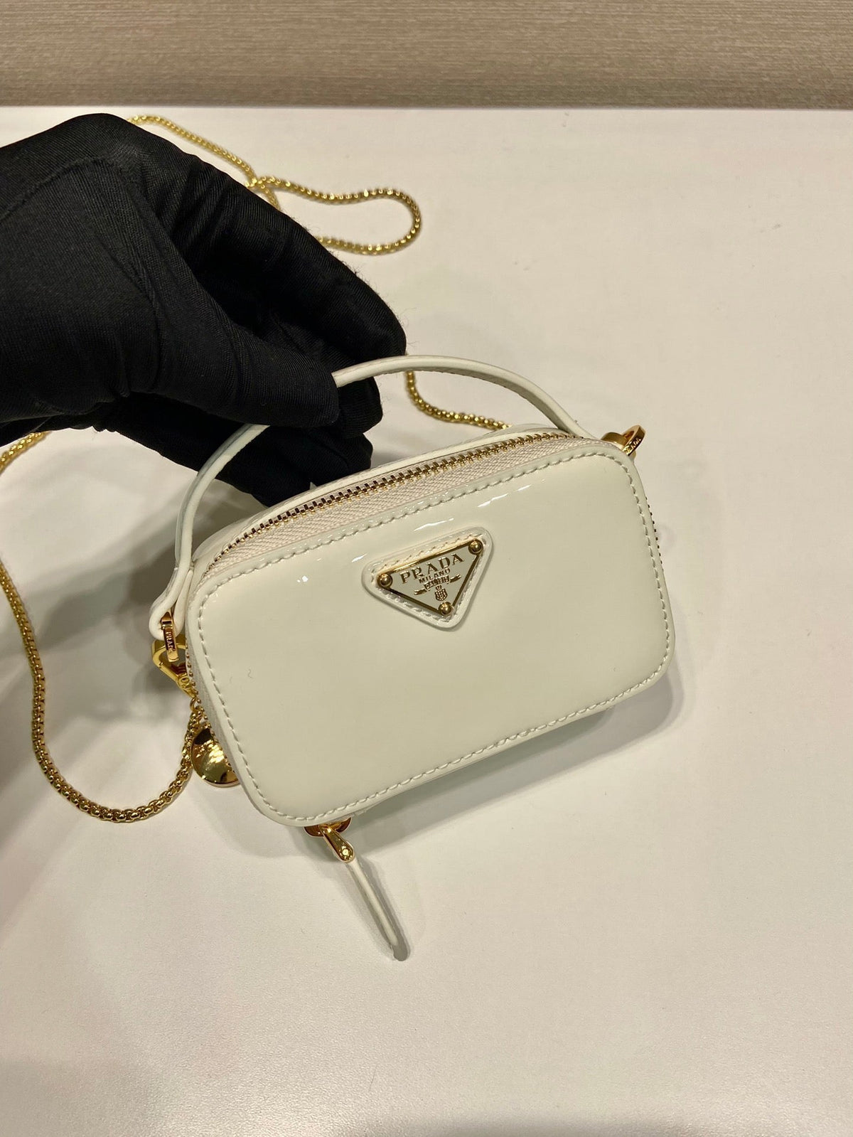 Prada Mini Hand Bag 11 with Gold Strap in White Patent Calfskin