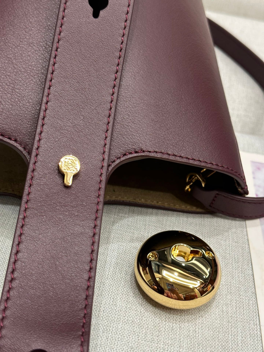 Loewe Mini 19 Pebble Bucket in Dark Burgundy Mellow Calfskin