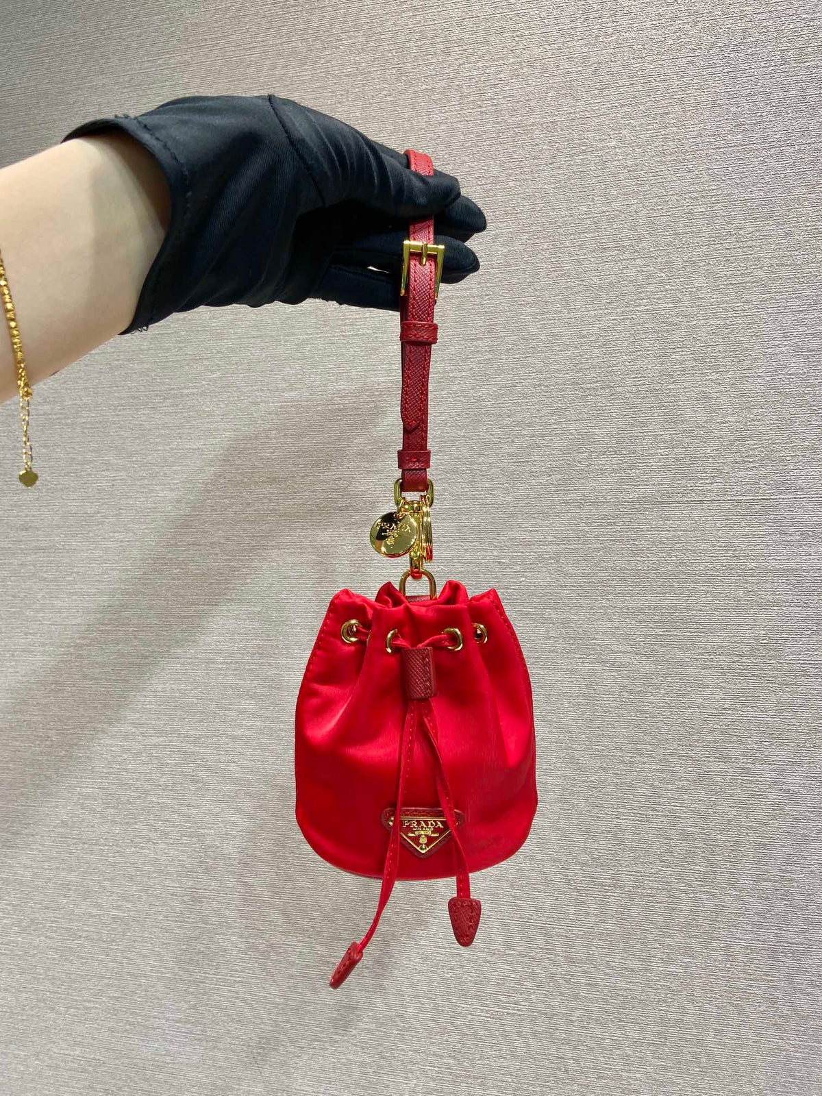 Prada Mini Bucket Bag 10 in Red Re-Nylon and Saffiano Leather Strap