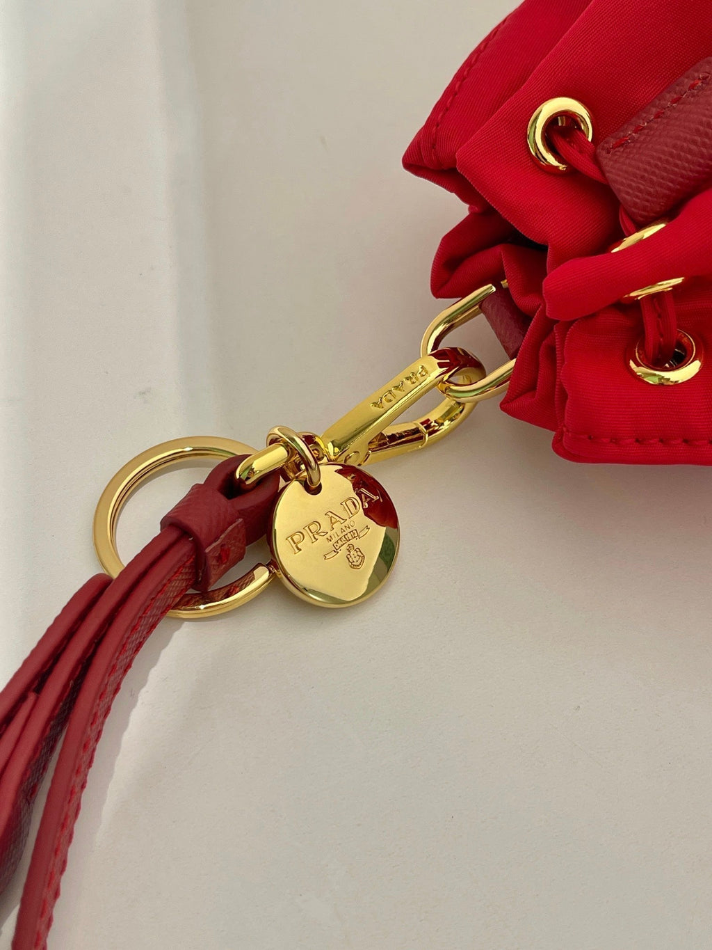 Prada Mini Bucket Bag 10 in Red Re-Nylon and Saffiano Leather Strap