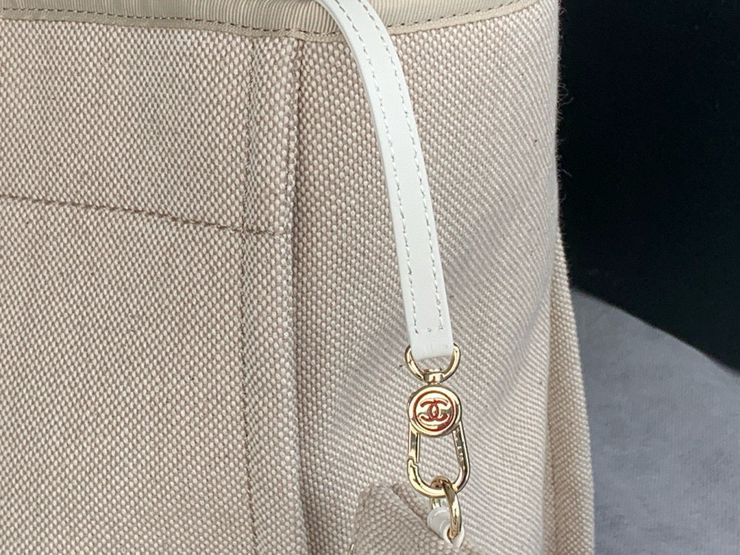 Chanel Shopping Bag 38 in Beige and White Canvas