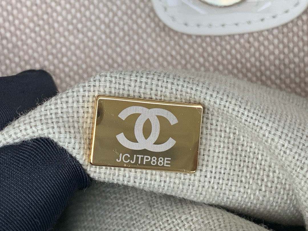 Chanel Shopping Bag 38 in Beige and White Canvas