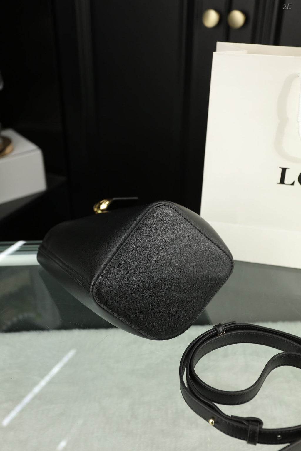Loewe Mini 19 Pebble Bucket in Black Mellow Calfskin