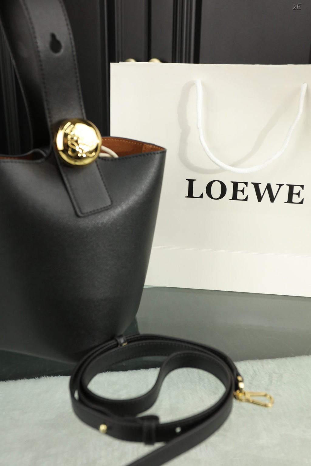 Loewe Mini 19 Pebble Bucket in Black Mellow Calfskin