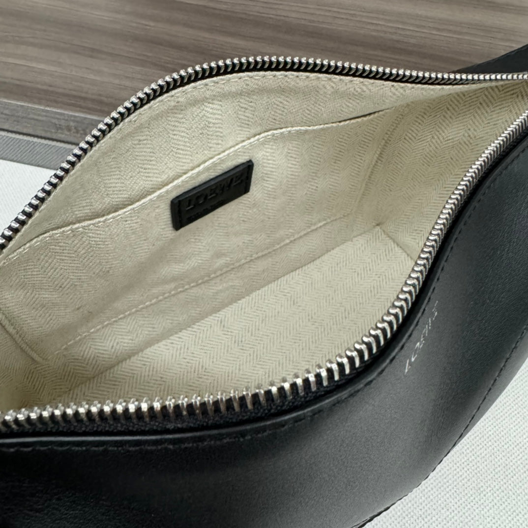 Loewe Puzzle Fold Wash 22 Bag in Black Shiny Calfskin