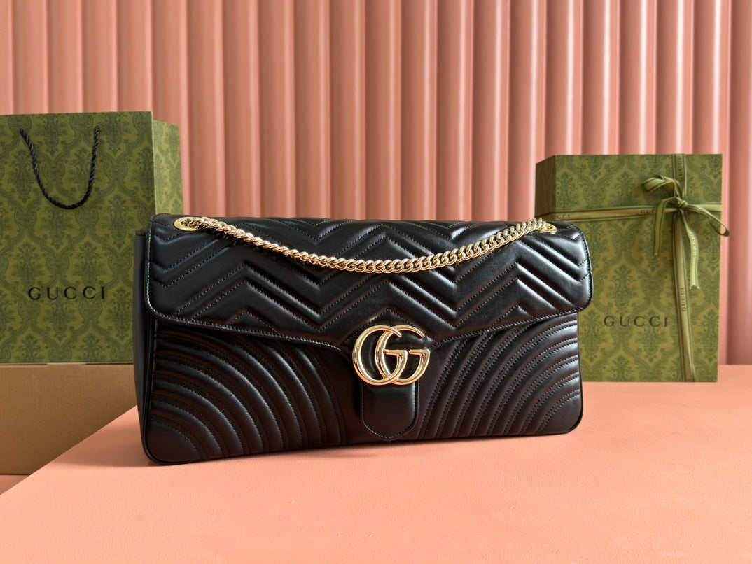 Gucci Marmont Shoulder Bag 40 in Black Calfskin Gold Chain