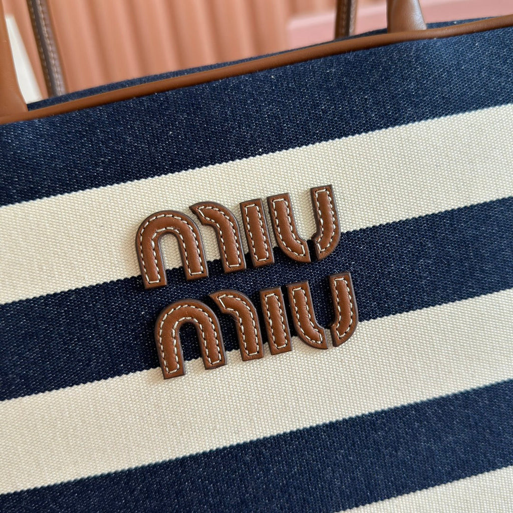 Miu Miu 25S Beau Bag 34 Dark Blue and Ivory in Canvas and Calfskin
