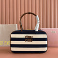 Miu Miu 25S Beau Bag 34 Dark Blue and Ivory in Canvas and Calfskin
