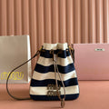 Miu Miu 26S Bucket Bag 23 in Cream and Navy Blue Canvas Gold Hardware