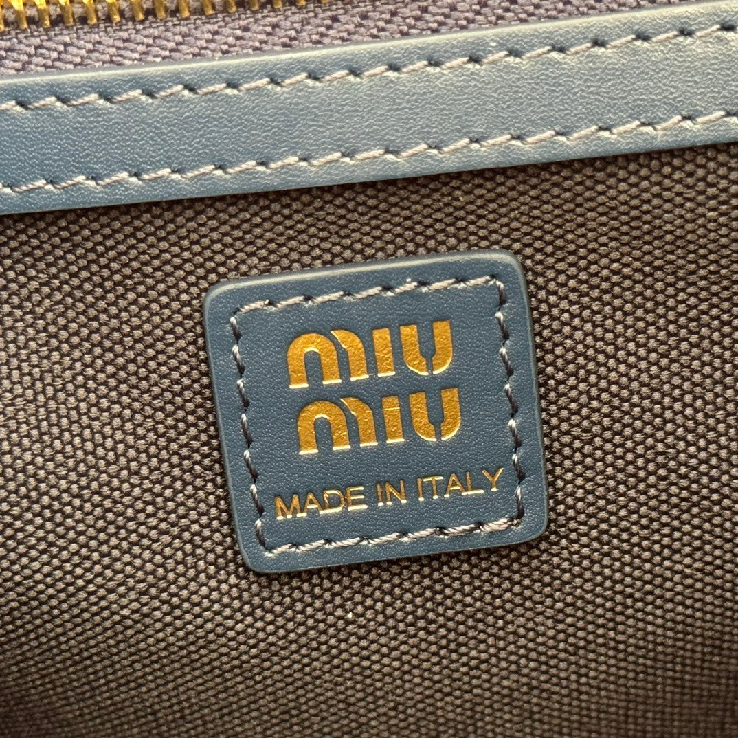 Miu Miu 26S Medium Backpack 29 in Dark Blue Canvas Blue Calfskin