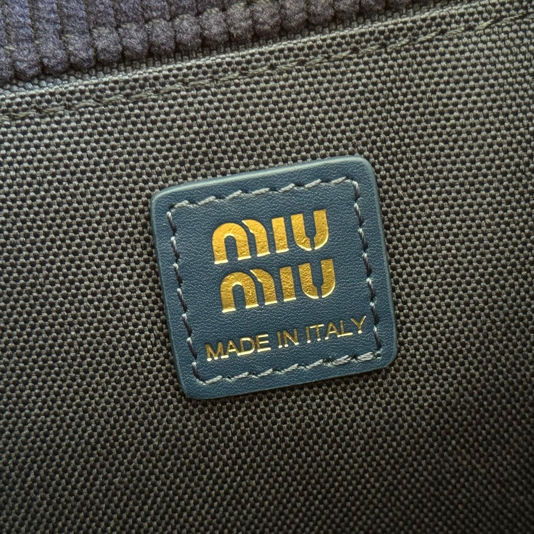 Miu Miu 26S Backpack 22 in Dark Blue Canvas Blue Calfskin