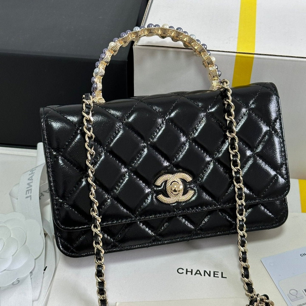 Chanel Pearl Handle Flap Bag 18 in Black Shiny Lambskin