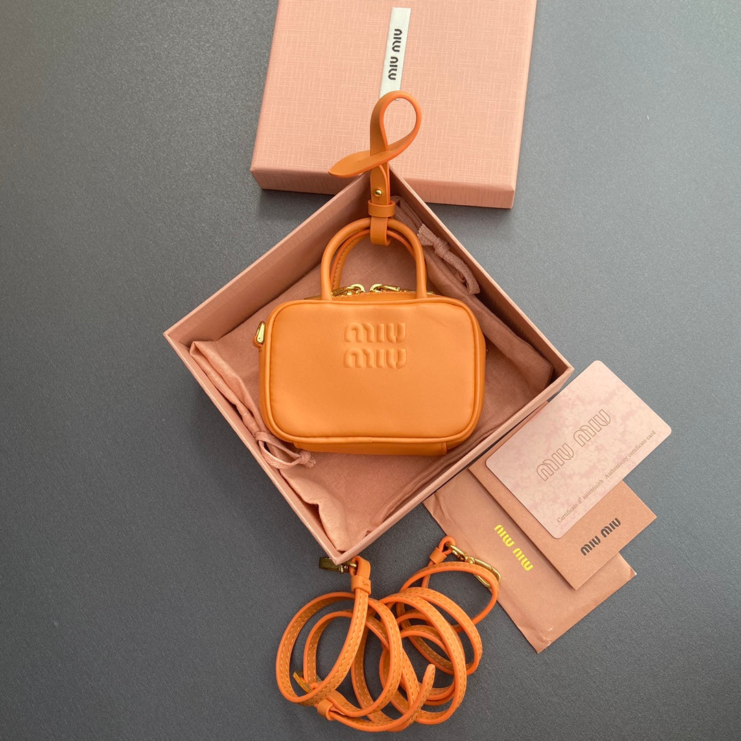 Micro Bag Keychain 11 in Hot Cinnamon Orange Calfskin Embossed Logo
