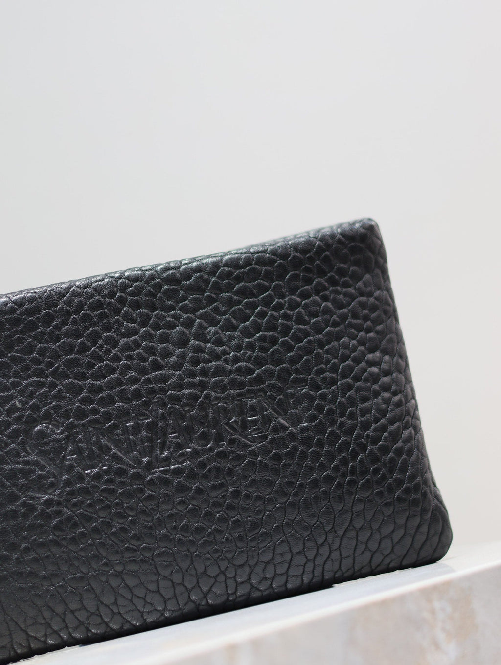 Saint Laurent Pouch with Elephant Texture 23 in Black Lambskin Logo Embossed